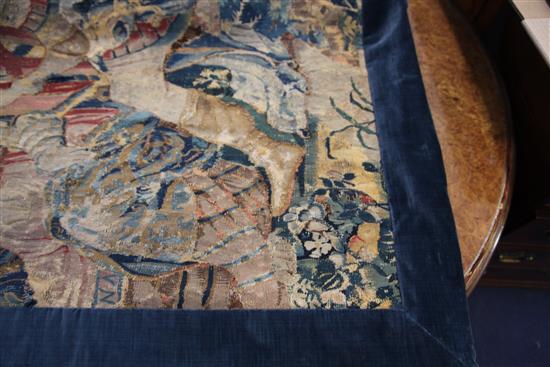 A 17th century tapestry fragment, W.3ft 4in. H.4ft 9in.